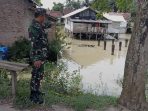 Intensitas Curah Hujan Tinggi, Babinsa Koramil Way Bungur Himbau Warga Tanjung Tirto Waspada