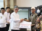 Korpri Ramadan Berbagi, Ketua Dewan Kopri Fahrizal Darminto Lampung Serahkan Bantuan dan Tali Asih