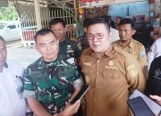 Bupati Riza Herdavid Dampingi Brigjen Arif Hendro Tanam Padi di Desa Rias