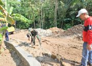 Pengerasan Jalan Area Cikerai TMMD ke-125 Kodim 0623/Cilegon Sudah Mencapai 75 Persen