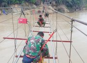 Akses Warga Kian Terbuka, Pembangunan Jembatan Gantung TNI di Aceh Masuki Tahap Akhir